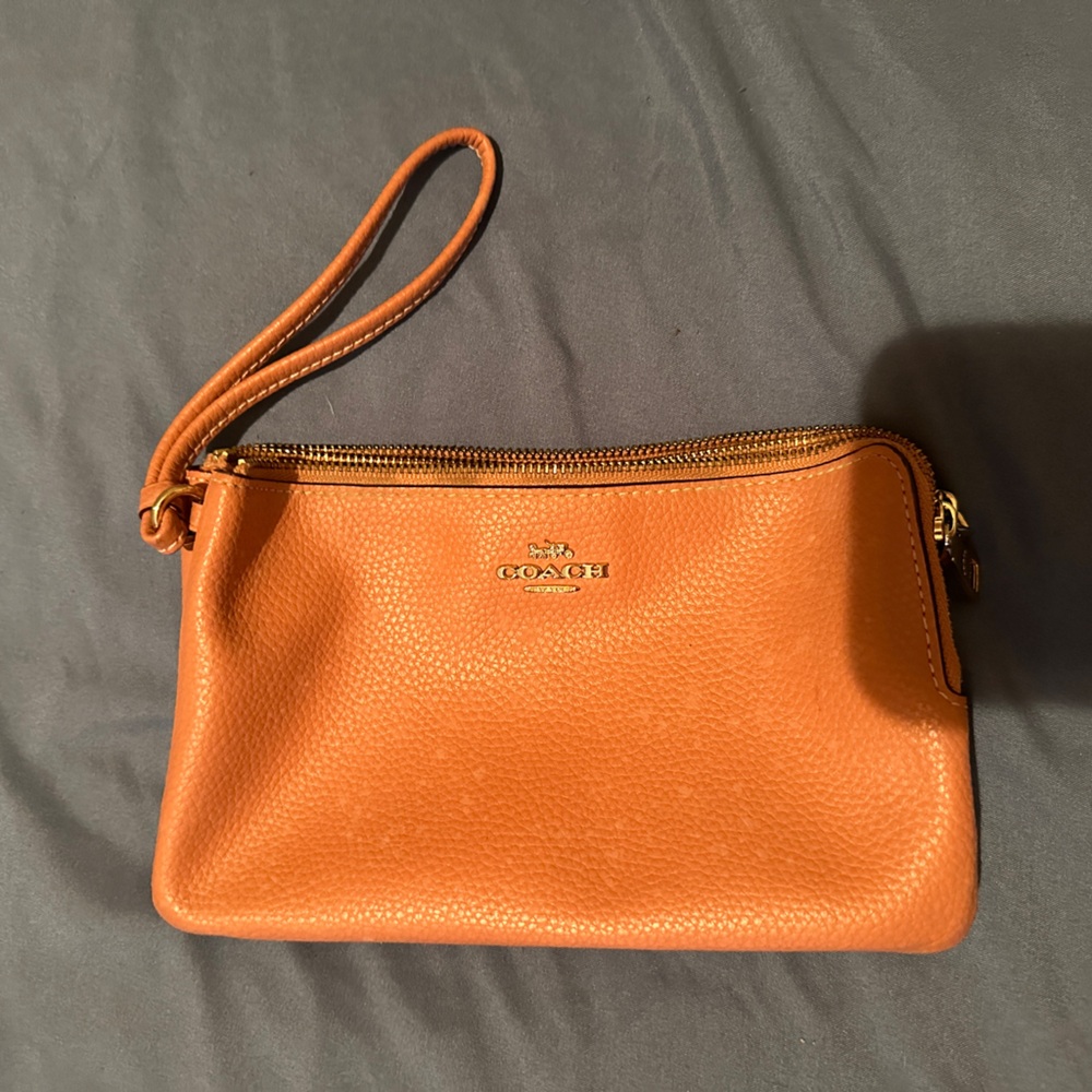Coach coral wristlet